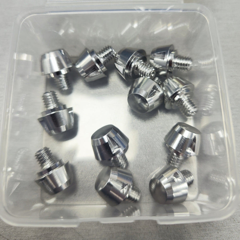 Lightweight aluminum replacement studs with key in a clear box, available in silver, gun metal, and black, compatible with boots 
